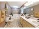 The bathroom offers a soaking tub, double vanity, and decorative accents creating a relaxing retreat at 180 Kim Trail Trl, Stockbridge, GA 30281