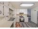 Bright kitchen featuring updated appliances, ample counter space, and stylish flooring at 180 Kim Trail Trl, Stockbridge, GA 30281