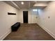 Finished basement featuring tiled floors, a bench and coat rack at 1134 Donnelly Sw Ave, Atlanta, GA 30310