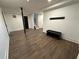 Finished basement featuring tiled floors, a bench and coat rack at 1134 Donnelly Sw Ave, Atlanta, GA 30310