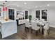 Open dining area with stylish furniture, hardwood floors, and modern decor at 1134 Donnelly Sw Ave, Atlanta, GA 30310