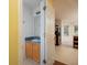 Bathroom with a vanity and a door leading to the kitchen at 148 Barrington Pkwy, Stockbridge, GA 30281