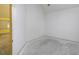 An empty room features a neutral color palette, primed for personalization and new beginnings at 148 Barrington Pkwy, Stockbridge, GA 30281
