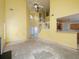Spacious living room with an open floor plan, high ceilings, and natural light, ready for renovation at 148 Barrington Pkwy, Stockbridge, GA 30281
