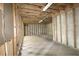 Unfinished basement with wood frame and concrete floor offers potential for customization at 2773 Hawk Trace Ne Ct, Marietta, GA 30066
