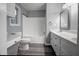 Well-lit bathroom features dual sinks, a tub and new hardware at 2773 Hawk Trace Ne Ct, Marietta, GA 30066