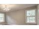 Bright bedroom with two windows and ceiling fan at 2773 Hawk Trace Ne Ct, Marietta, GA 30066