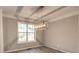 Dining room featuring unique lighting and large window at 2773 Hawk Trace Ne Ct, Marietta, GA 30066