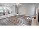 Sun-filled living area with a fireplace and sleek laminate flooring at 2773 Hawk Trace Ne Ct, Marietta, GA 30066