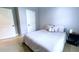 Cozy bedroom with soft gray walls and neutral bedding, offering a peaceful and relaxing atmosphere at 420 Ashbury Cir, Dallas, GA 30157