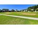 Large and well-maintained community green space and sidewalk perfect for outdoor recreation at 420 Ashbury Cir, Dallas, GA 30157
