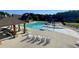 Resort-style community pool featuring a slide, splash zone, lap lanes, and ample lounge seating at 420 Ashbury Cir, Dallas, GA 30157