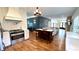 Open kitchen design with stainless steel appliances, stone countertops, and center island at 420 Ashbury Cir, Dallas, GA 30157