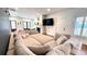 Open living space with shiplap accent wall, fireplace, and comfortable sectional sofa at 420 Ashbury Cir, Dallas, GA 30157