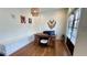 Bright office space features a built-in desk, storage bench, and hardwood floors at 420 Ashbury Cir, Dallas, GA 30157