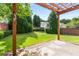 Backyard featuring an outdoor patio and pergola at 5035 Foxberry Ln, Roswell, GA 30075