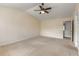 Spacious bedroom with vaulted ceiling and ceiling fan at 5035 Foxberry Ln, Roswell, GA 30075