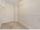 Walk-in closet with carpeted flooring and wire shelving at 5035 Foxberry Ln, Roswell, GA 30075