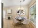Dining area with chandelier and natural light at 5035 Foxberry Ln, Roswell, GA 30075