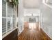 Inviting foyer with gleaming hardwood floors and neutral walls, offering a glimpse into the spacious living areas at 5035 Foxberry Ln, Roswell, GA 30075