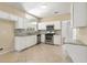 Traditional kitchen features granite countertops and stainless steel appliances at 5035 Foxberry Ln, Roswell, GA 30075