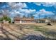 The backyard is flat, spacious, and ready for various outdoor possibilities at 11 Grove Ln, Hampton, GA 30228