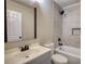 Modern bathroom featuring updated fixtures, tiled walls, and a clean, stylish design at 11 Grove Ln, Hampton, GA 30228