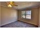 Bedroom with hard wood floors, natural lighting, and neutral paint at 11 Grove Ln, Hampton, GA 30228