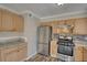 Recently updated kitchen featuring stainless steel appliances, stylish cabinets and modern flooring at 11 Grove Ln, Hampton, GA 30228
