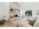 Relaxing living room with a cozy fireplace, access to the deck and lots of natural light at 2010 Barnes Mill Rd, Marietta, GA 30062