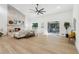 Spacious living room features a stone fireplace, hardwood floors, and backyard access at 2010 Barnes Mill Rd, Marietta, GA 30062