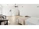 Spacious main bedroom with a ceiling fan and a luxurious ensuite bathroom with lots of natural light at 2010 Barnes Mill Rd, Marietta, GA 30062