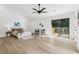 Serene main bedroom with a ceiling fan and access to the outdoor deck with forest views at 2010 Barnes Mill Rd, Marietta, GA 30062