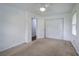 Bright bedroom offers a ceiling fan and closet, providing versatile and comfortable living space at 2122 Browntown Rd, Rockmart, GA 30153