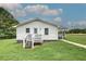 Well-maintained single-story home with lush green lawn and inviting front entry and porch at 2122 Browntown Rd, Rockmart, GA 30153