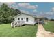 Charming cottage style home with inviting porch, manicured lawn and classic curb appeal at 2122 Browntown Rd, Rockmart, GA 30153