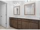 Bathroom featuring double sink vanity with modern fixtures and framed mirrors at 340 Olmstead Way # 34, Alpharetta, GA 30022