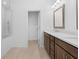 Bathroom featuring double sink vanity with modern fixtures and a tiled shower at 340 Olmstead Way # 34, Alpharetta, GA 30022