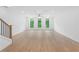 Bright living room with hardwood floors, large windows, and neutral paint at 340 Olmstead Way # 34, Alpharetta, GA 30022