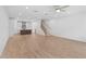 Bright and spacious living area with an open floor plan to the kitchen and stairs at 340 Olmstead Way # 34, Alpharetta, GA 30022