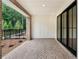 Covered patio with brick floors, white paneling, and large sliding doors offering an outdoor living space at 340 Olmstead Way # 34, Alpharetta, GA 30022