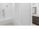 Bright walk-in shower with bench and white subway tile at 340 Olmstead Way # 34, Alpharetta, GA 30022