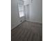Bright bedroom with neutral carpet, window, and fresh, white paint throughout at 5400 Louis Xiv Ln, Atlanta, GA 30349