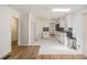 Open kitchen with updated cabinetry and seamless flow into the living area at 5400 Louis Xiv Ln, Atlanta, GA 30349
