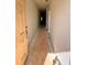 Hallway with door showcasing new construction ready for customization and design at 7216 Eton Ln, Locust Grove, GA 30248