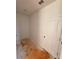 A versatile room ready for customization with a neutral color palette and an accessible door at 7216 Eton Ln, Locust Grove, GA 30248