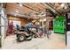 Spacious garage offers ample storage space with high ceilings and a variety of tools at 1491 Stonington Ct, Villa Rica, GA 30180