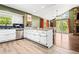 Open-concept kitchen with granite counters, an island, stainless appliances, and eat-in dining at 1491 Stonington Ct, Villa Rica, GA 30180