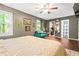Bedroom with hardwood floors and an attached closet and bathroom at 1491 Stonington Ct, Villa Rica, GA 30180