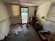 Basement featuring an exterior door, windows, and ample space at 2933 Arlington Rd, East Point, GA 30344
